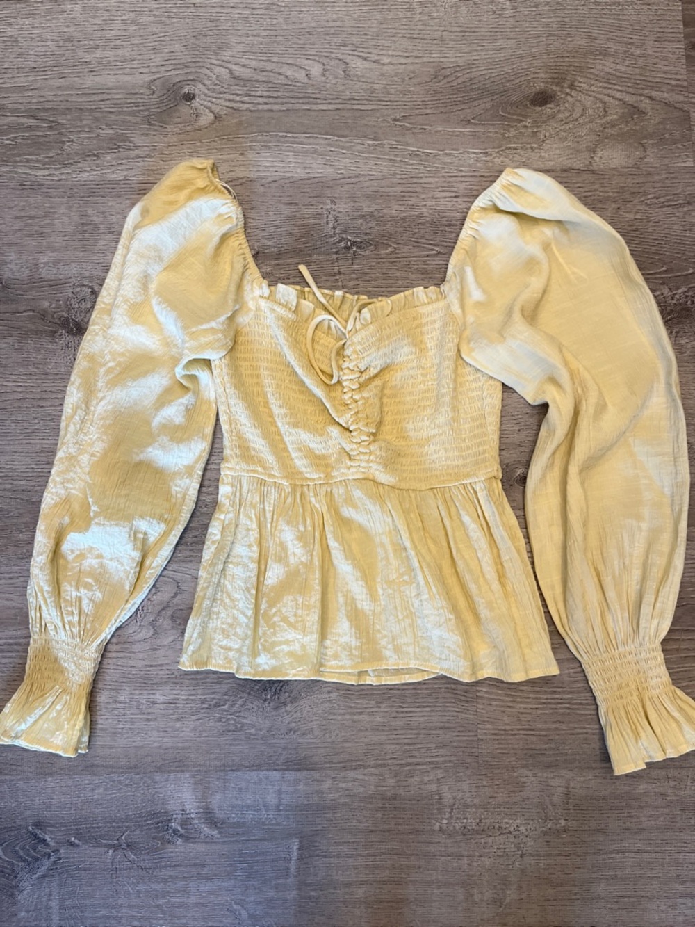 A. Calin by flying tomato creme yellow Smocked Puff-Sleeve Peplum Blouse Size M